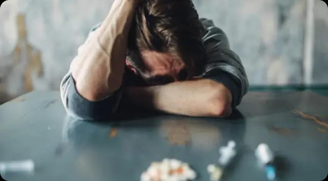 Man overwhelmed by substance use — Newport Beach rehab programs treat complex polysubstance addiction.