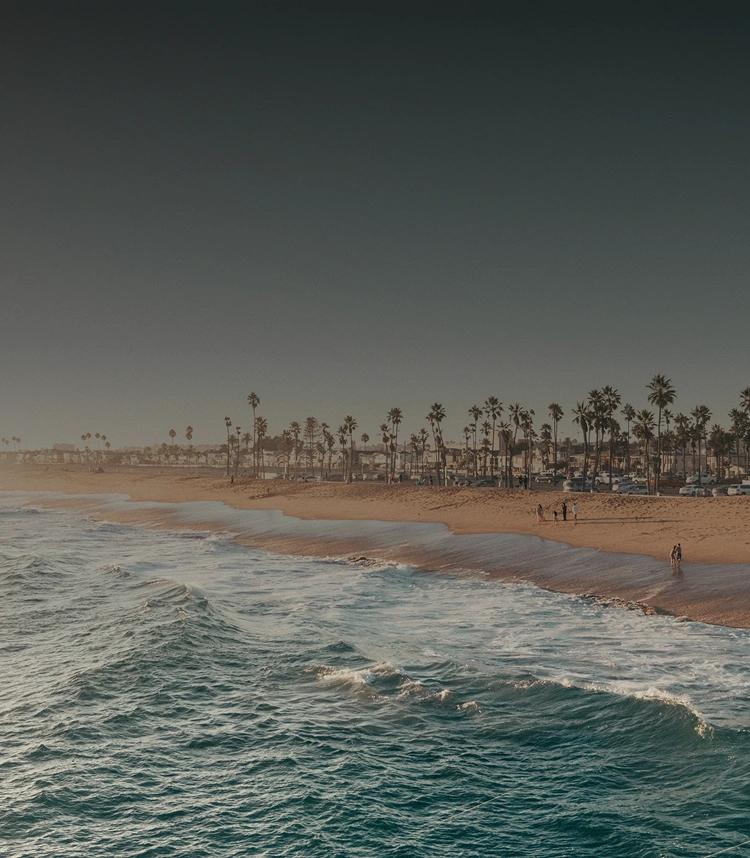 Scenic view of Newport Beach at sunset — peaceful oceanfront setting ideal for reflection and healing during addiction recovery.