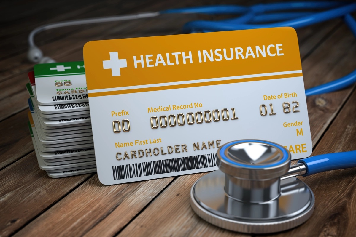 Drug Rehab: Health insurance cards sitting on a table