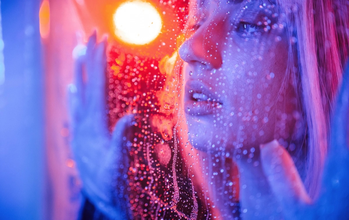 A Woman with Hebephrenic Schizophrenia at a Wet Window