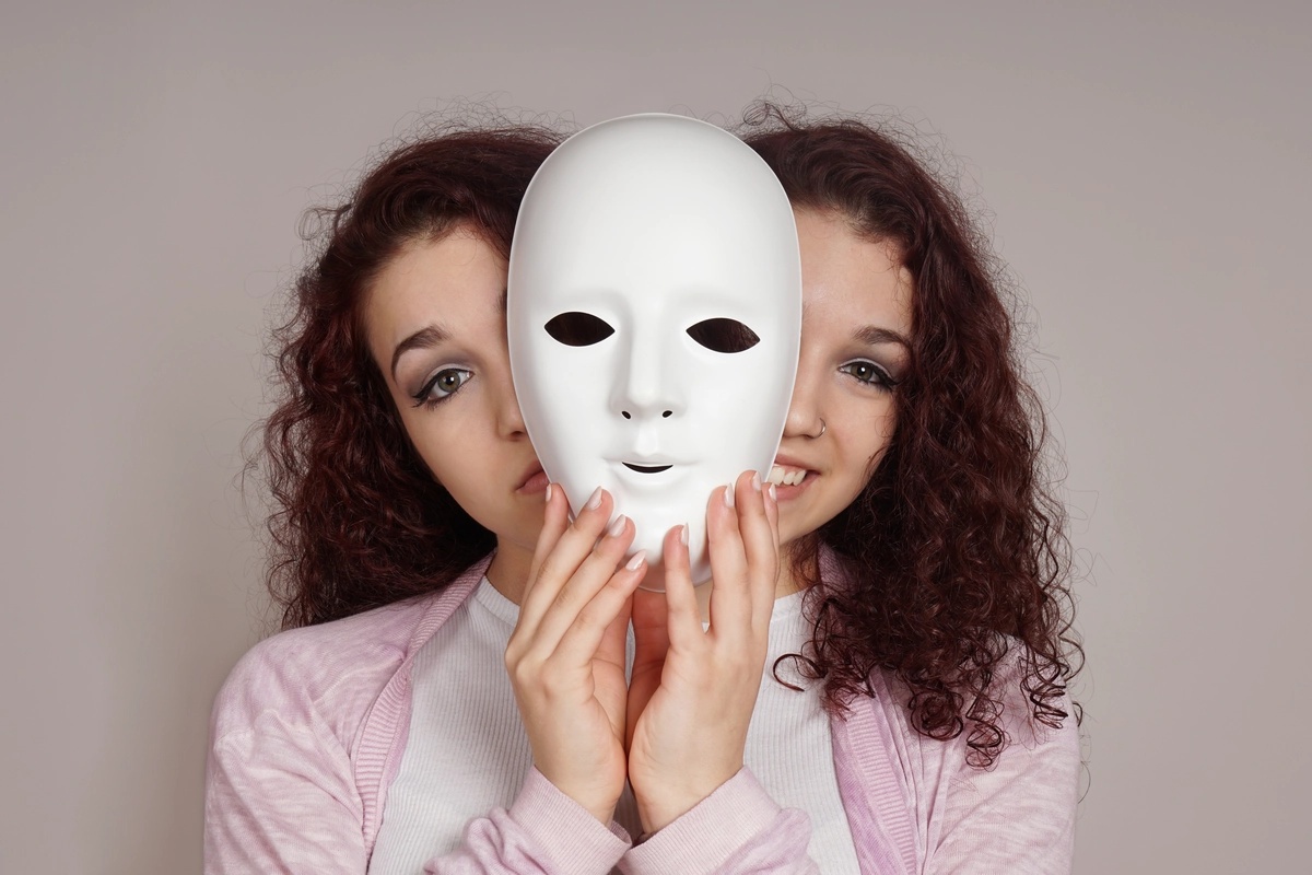 Bipolar Disorder - Girl with Mask on Happy and Sad