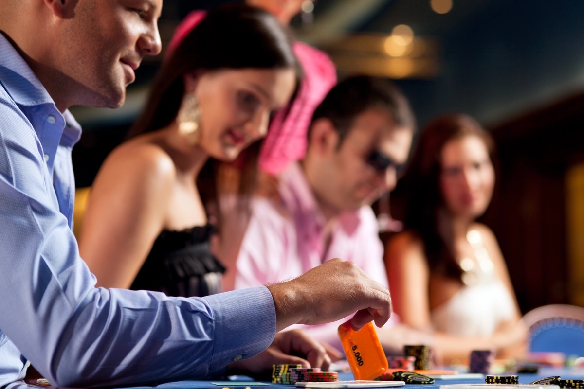 Gambling Addiction: Man playing poker at a casino